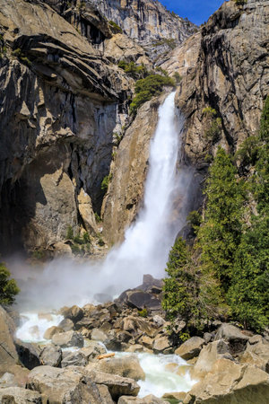 Close up of Lower Yosemite Falls full of snowmelt water in the spring in Yosemite National Park, Sierra Nevada mountain range in California, USAの写真素材