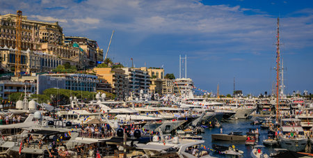 Monte Carlo, Monaco - May 27, 2023: Waterfront cityscape with luxury apartment buildings and boats in Yacht Club marina harbor in the portのeditorial素材
