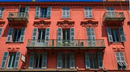 Picturesque colorful traditional old houses on a street in the Old Town, Vieille Ville in Nice, French Riviera, South of Franceの写真素材