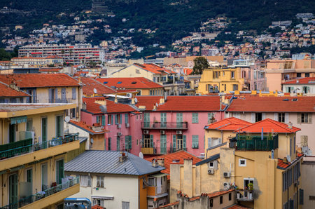 Aerial view of the bourgeois buildings and terracotta rooftops of the Carre d'Or Golden Square chic...