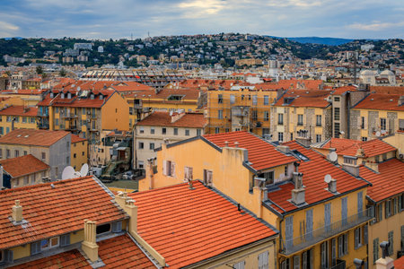 Aerial view of the bourgeois buildings and terracotta rooftops of the Carre d'Or Golden Square chic seafront district in Nice, South of Franceの写真素材
