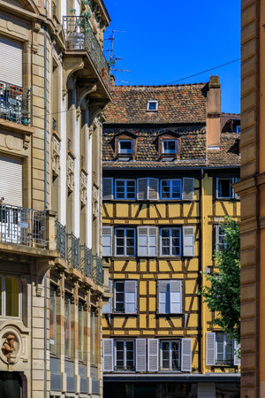 Ornate traditional half timbered houses in the old town of Grande Ile, the historic center of Strasbourg, Alsace, Franceの写真素材