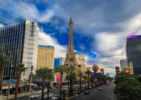 Las Vegas, Nevada, USA - October 24, 2021: The Eiffel Tower replica at Paris, Bally's, Bellagio, and other hotels lining the Strip under a cloudy skyのeditorial素材