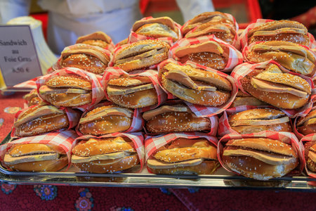 Delicious foie gras sandwiches on display for sale at a restaurant chalet the Chrismas Market in Strasbourg, Franceの写真素材