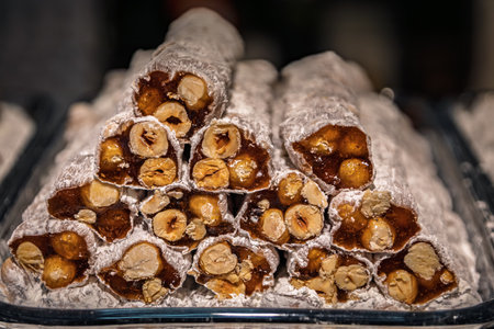 Selection of turkish delight nougat with hazelnut candy neatly arranged on display at at the...