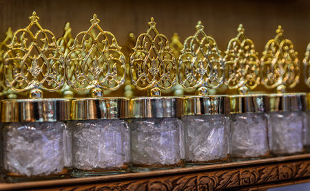 Menthol crystals for aromatherapy in ornate jars with gold lids arranged on display at the Egyptian...