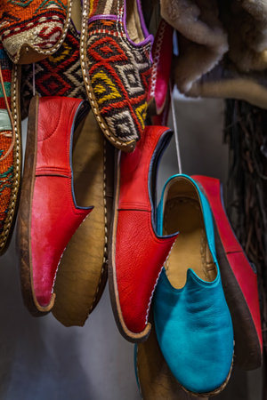 Handmade Turkish leather shoes, or Yemeni slippers, with traditional stitching for sale at a shop in...
