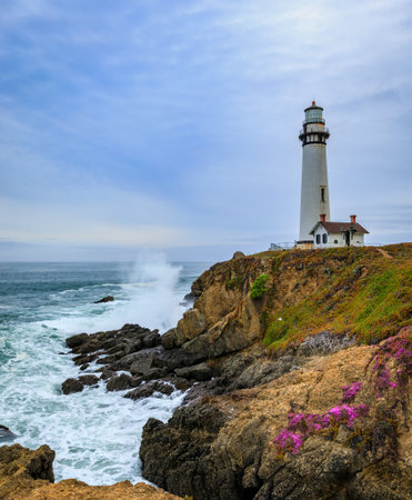 Waves crashing on the shore by Pigeon Point Lighthouse on Northern California Pacific Ocean coastline near Pescadero just before sunsetの写真素材