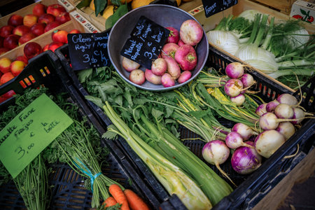 Pink turnips at a vegetable stand in the Cours Saleya provencal farmers market in the Old Town of...