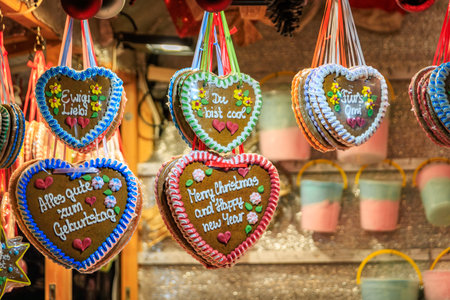 Ornate heart shaped artisanal handmade gingerbread Lebkuchen cookies on display at the charming traditional Christmas Market in Zurich, Switzerlandの写真素材