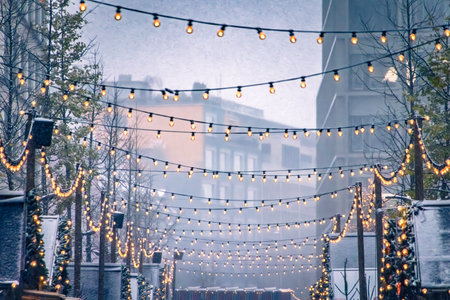A magical scene at the Zurich Christmas Market in Switzerland, with twinkling lights and snowfall creating a winter wonderland, defocused bokehの写真素材