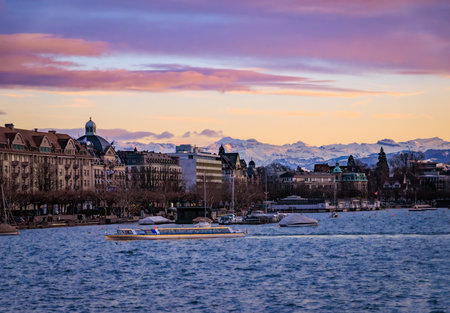 Lake Zurich and the cityscape, beautiful view with majestic Swiss Alps in the background during Christmas holidays, Zurich, Switzerlandの写真素材