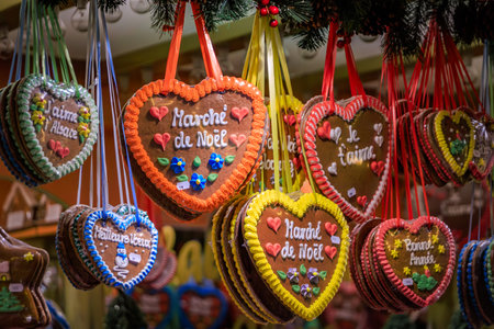 Ornate heart shaped artisanal handmade gingerbread Pain d epices cookies on display at the charming traditional Christmas Market in Strasbourg, Franceの写真素材