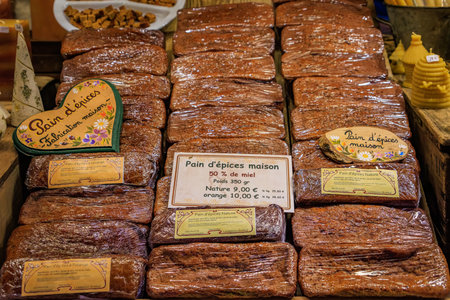 Strasbourg, France - December 13, 2024: Traditional artisanal homemade gingerbread loaves on display at an artisanal bakery around Christmasのeditorial素材