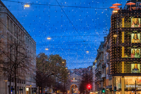 Zurich, Switzerland - December 21, 2024: Iconic Lucy lights illuminate Bahnhofstrasse, the busy shopping street, during the Christmas holiday seasonのeditorial素材