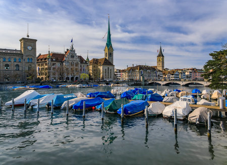 Cityscape of Zurich, Switzerland, with the iconic Fraumunster and St Peter churches and historic buildings on the Limmat in the Altstadt Old Townの写真素材
