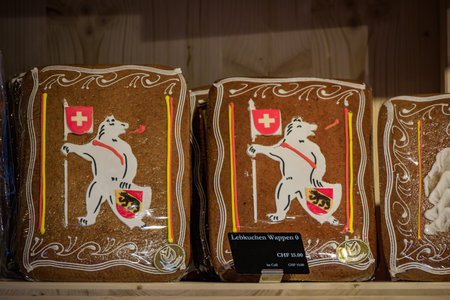 Artisan Lebkuchen gingerbread cookies with traditional white icing bear ornaments on display at the charming Christmas Market in Bern, Switzerlandの写真素材