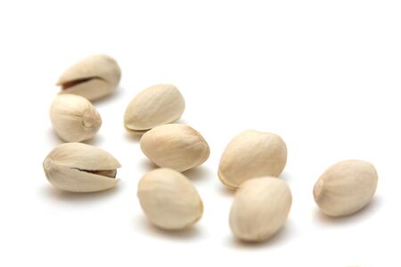 Pistachios on a light background isolatedの写真素材