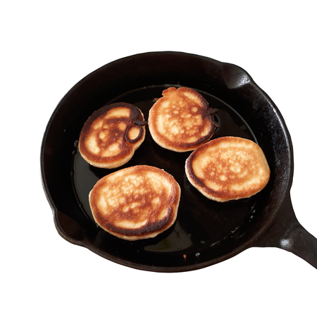 Isolated photo image of a pancake in a frying pan.の写真素材