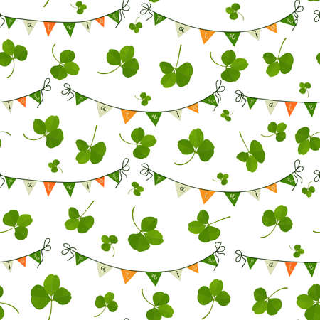 Festive pattern with flags and shamrock leaves in the colors of the Irish flag on a seamless backgroundのイラスト素材