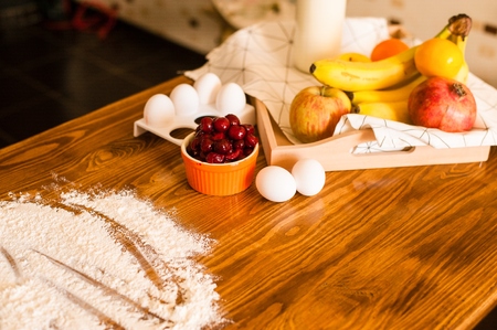 ingredients for dessert on kitchen wooden table, cooking, recipeの写真素材