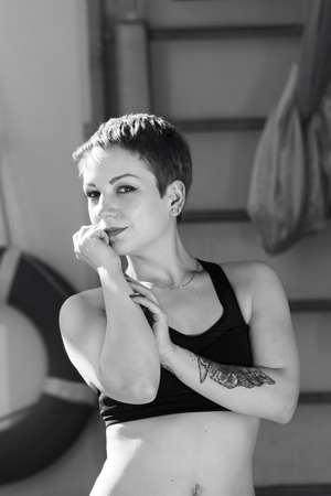 sports girl posing in fitness studioの写真素材