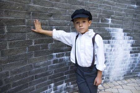 Boy near the wall.の写真素材