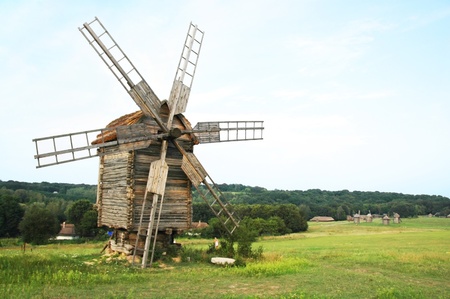 Evening landscape with windmill.の写真素材