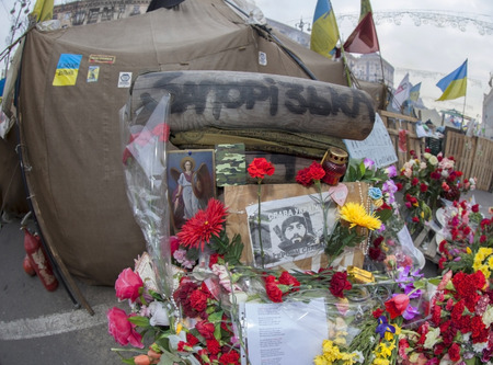 Flowers in honer of heroes killed on barricades in Kiev during mass protests on Euromaidan  のeditorial素材
