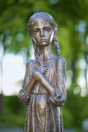 Detail of Memorial to victims of famine in Ukraine in Park of Glory in Kiev の写真素材