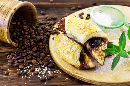 Croissants with chocolate on a wooden backgroundの写真素材