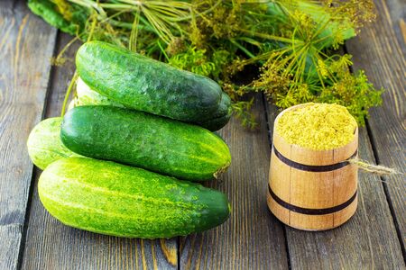 Fresh cucumbers. Summer. Wooden background.の写真素材