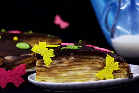 Pancake cake. Dark background.