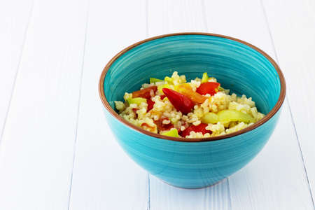 Rice with vegetables in Chinese. White background.の写真素材