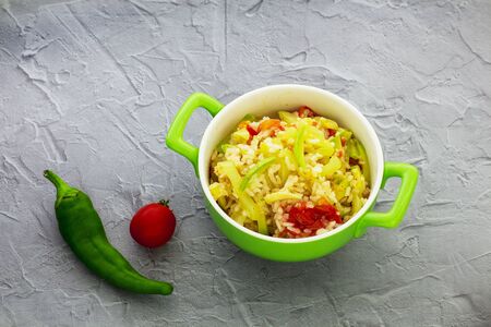 Rice with vegetables in Chinese. Gray background.の写真素材