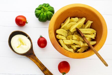 The dumplings are homemade in a bowl. White background. View from above.の写真素材