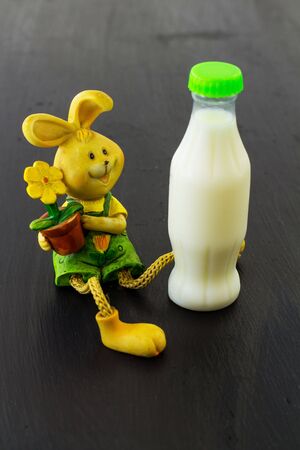 A figurine is a bunny. Black background.の写真素材