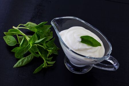 Mayonnaise on a black background.の写真素材
