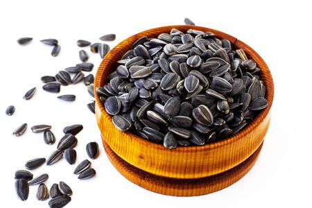 Sunflower seeds. White background.の写真素材