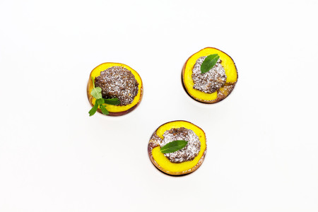 Baked peaches. White background. View from above.の写真素材