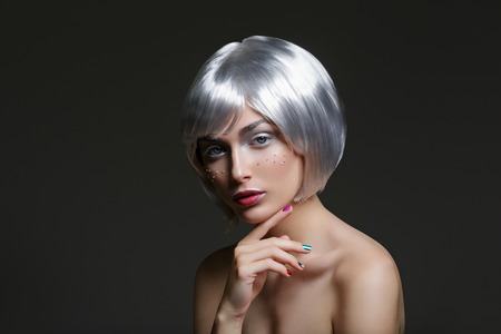 Beautiful girl in silver wigの写真素材