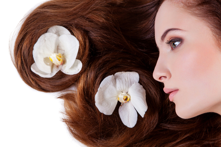 Beautiful girl with long red hairの写真素材