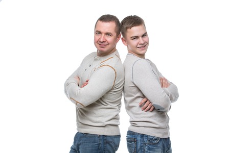 Father and son standingの写真素材