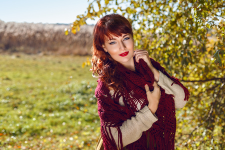 Beautiful girl outdoors in countrysideの写真素材