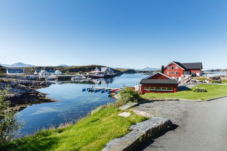 beautiful view on norwegian fjord with houses along coastline. outdoor shot in Norway. copy space.