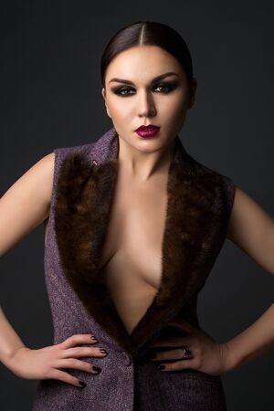 beautiful young woman with dark makeupの写真素材