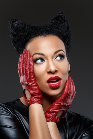 girl with bright makeup and horns hairstyleの写真素材