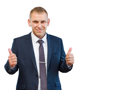 Businessman in blue suit showing Like fingers on a white background