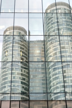 Reflection of one skyscraper to another;  Business district of La Defense, Paris, France