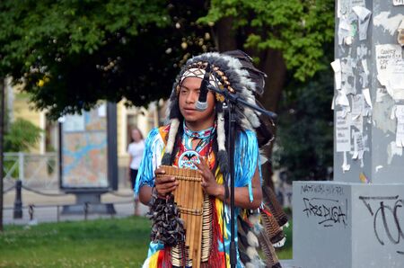 Peruvian street musician with pan flute on the street of St-Petersburg, Russia 